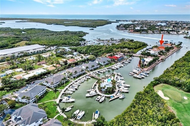 drone / aerial view with a water view