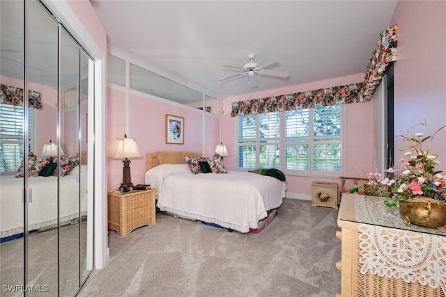 bedroom with ceiling fan and carpet