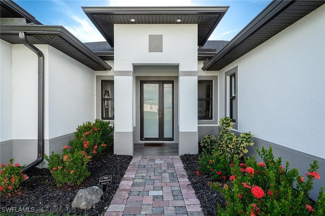 doorway to property with french doors