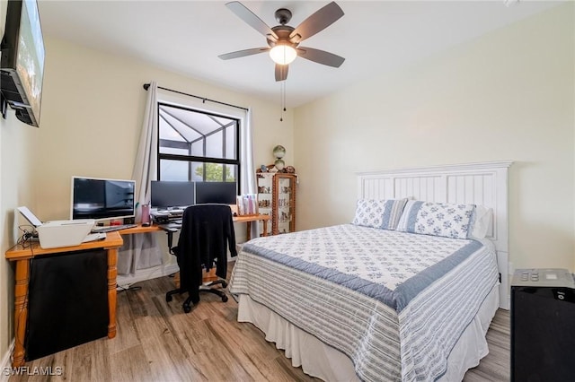 bedroom featuring ceiling fan and light wood-type flooring