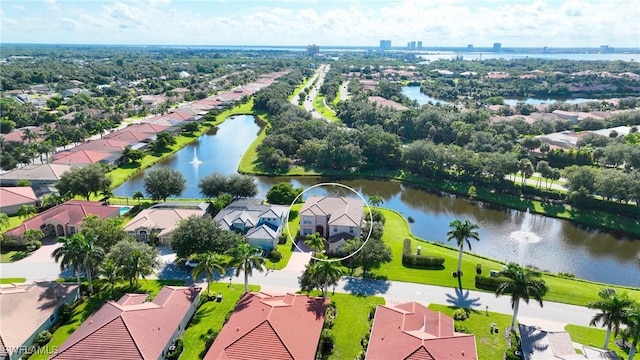 drone / aerial view featuring a water view