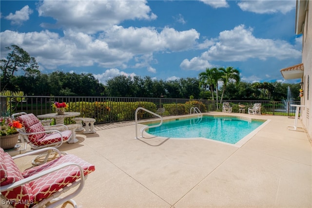 view of pool with a patio