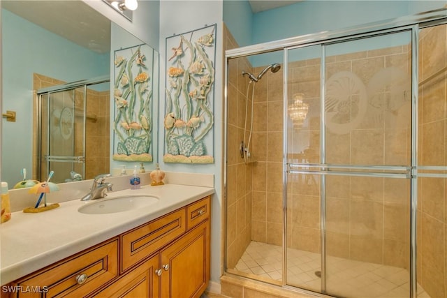 bathroom with vanity and walk in shower