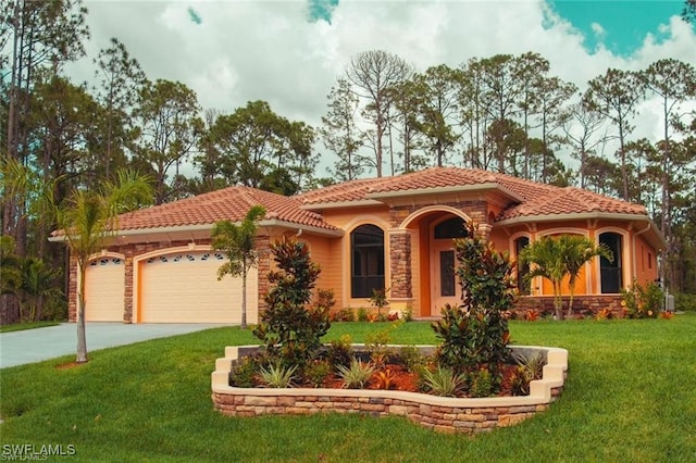 mediterranean / spanish-style house with a garage and a front yard