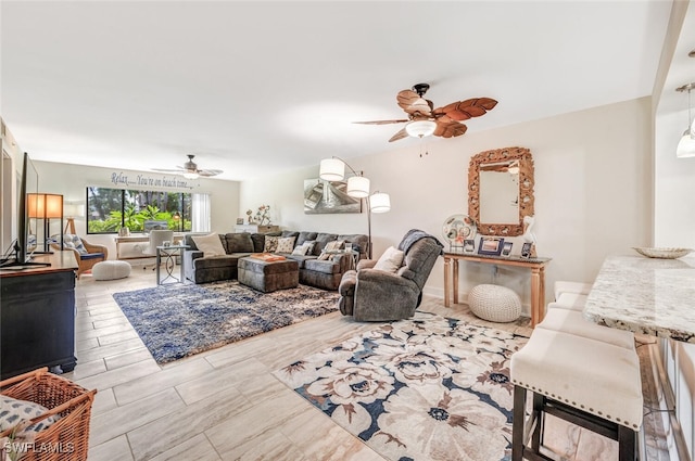 living room featuring ceiling fan