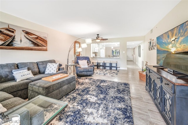 living room with ceiling fan