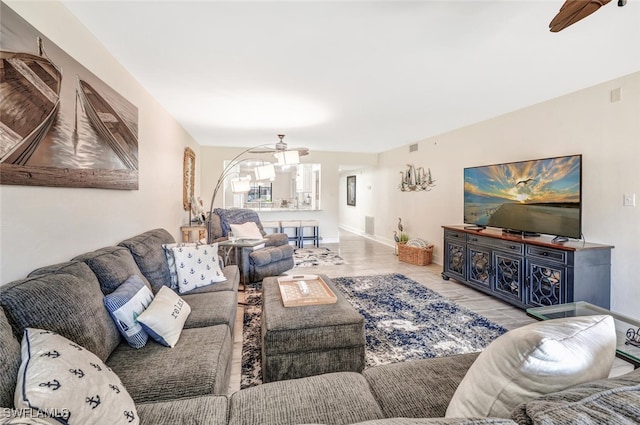 living room featuring ceiling fan