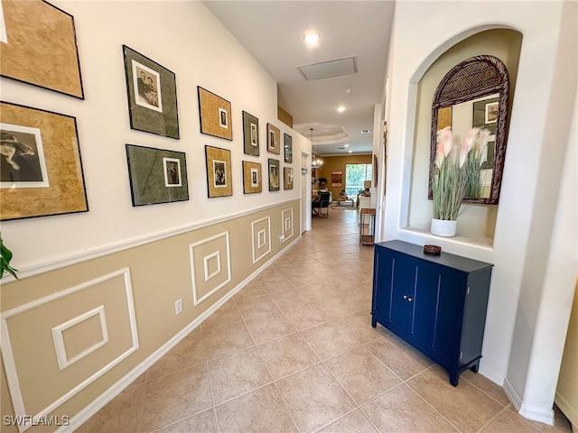 hallway with light tile patterned floors