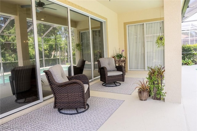 view of patio featuring a ceiling fan