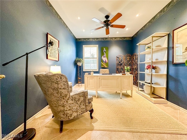 tiled office featuring ceiling fan