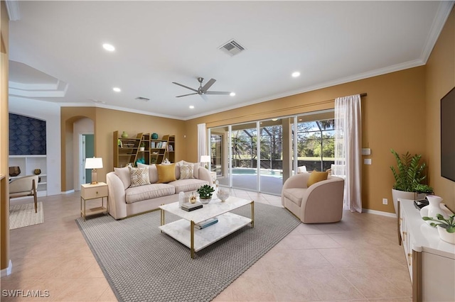 living area featuring baseboards, recessed lighting, visible vents, and crown molding