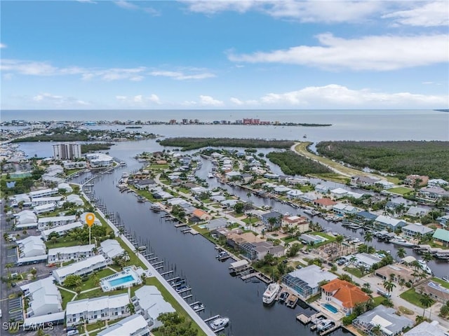 aerial view with a water view and a residential view