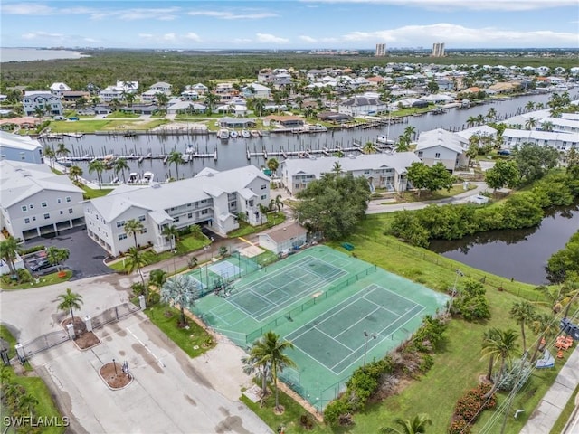 bird's eye view with a water view and a residential view