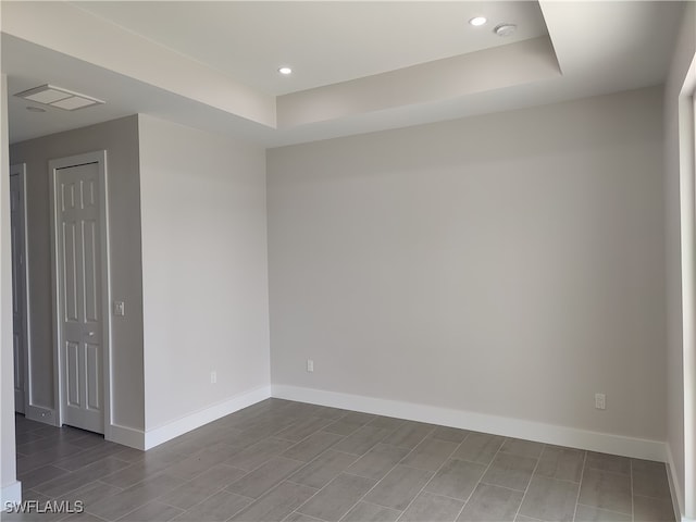 empty room with dark wood-type flooring