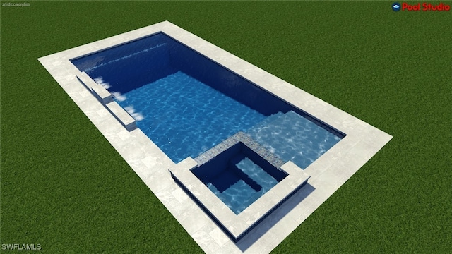 view of swimming pool featuring a lawn