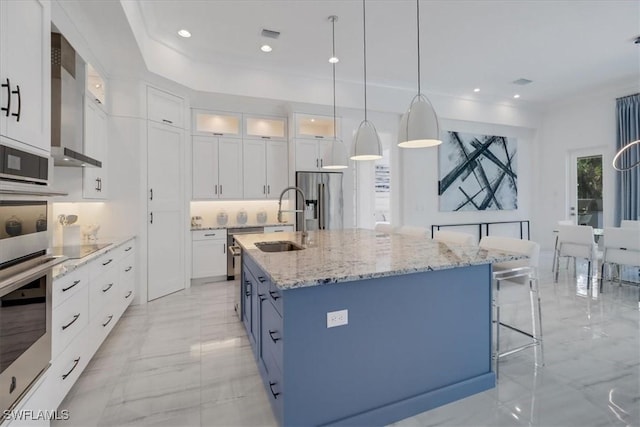 kitchen featuring stainless steel fridge, glass insert cabinets, marble finish floor, white cabinetry, and a sink