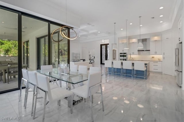 dining room featuring recessed lighting