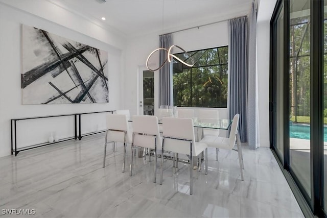 dining room featuring marble finish floor and recessed lighting