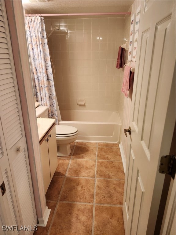 full bathroom featuring toilet, shower / bathtub combination with curtain, tile patterned floors, and vanity