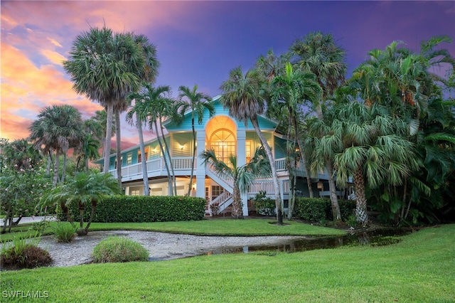 view of outdoor building at dusk