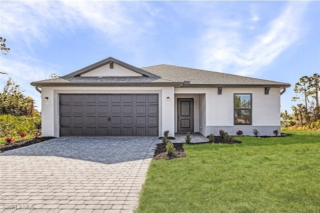 826 Yellowbird Dr, Fort Myers, FL 33913 - ranch-style house with a front yard, a shingled roof, a garage, stucco siding, and decorative driveway