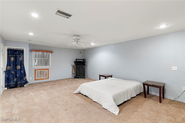 bedroom featuring light colored carpet and ceiling fan