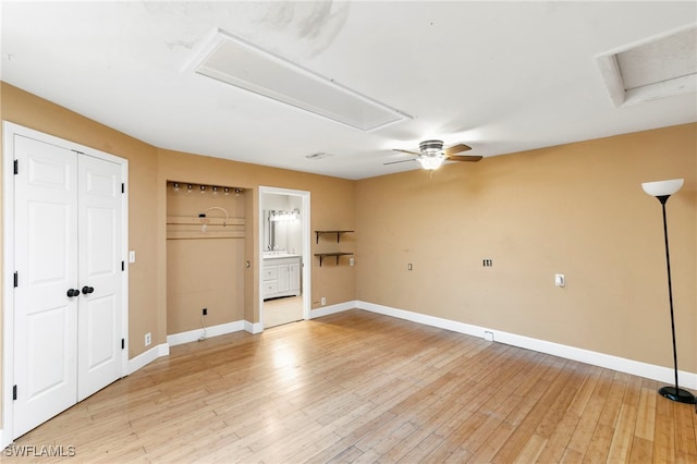 unfurnished room featuring ceiling fan and light hardwood / wood-style floors