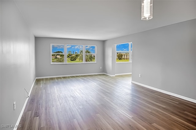 spare room featuring hardwood / wood-style flooring