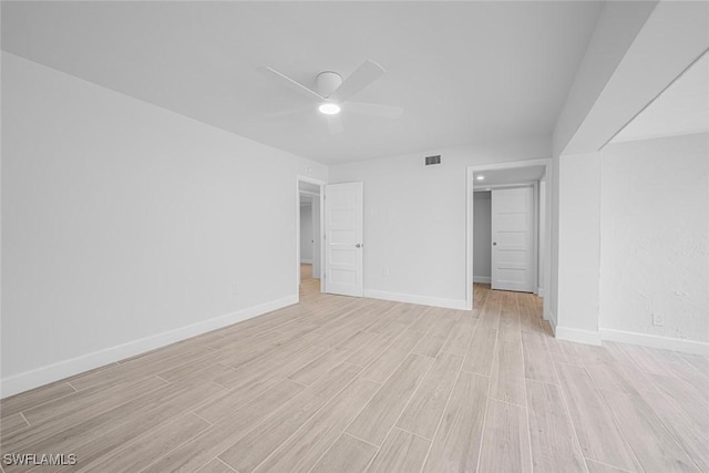 unfurnished bedroom with a closet, light hardwood / wood-style flooring, and ceiling fan