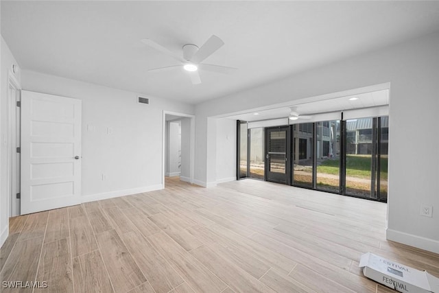 empty room featuring ceiling fan