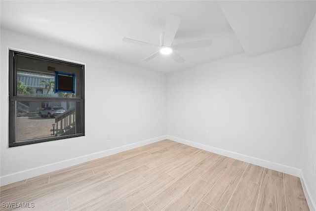 unfurnished room with ceiling fan