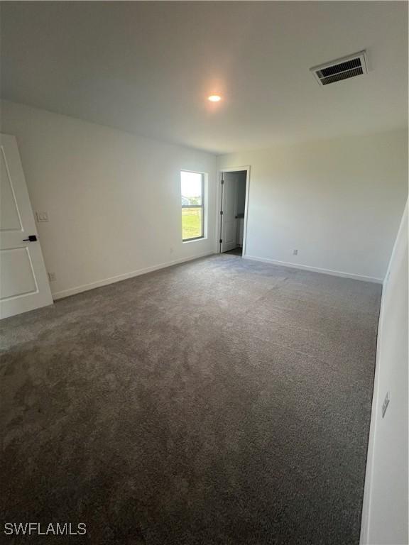 view of carpeted spare room