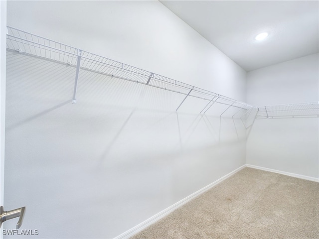 1057 Presque Isle Dr, Port Charlotte, FL 33952 - spacious closet featuring carpet flooring