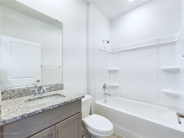 1057 Presque Isle Dr, Port Charlotte, FL 33952 - full bathroom featuring toilet, vanity, and bathtub / shower combination