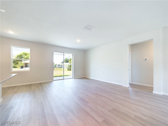 empty room featuring light hardwood / wood-style floors