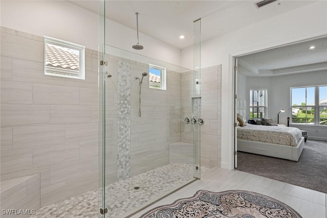 bathroom featuring a stall shower, tile patterned flooring, recessed lighting, and ensuite bathroom