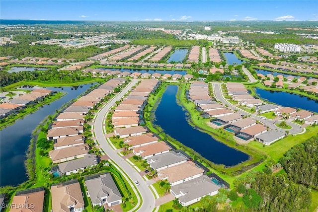 aerial view with a water view and a residential view