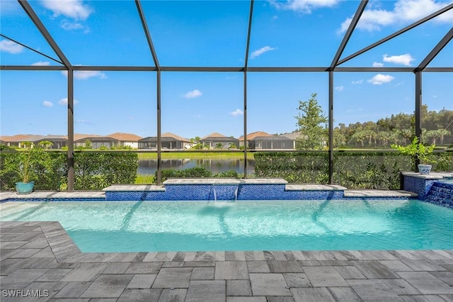 pool featuring a water view and glass enclosure