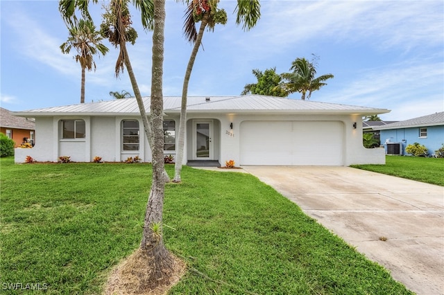 single story home with central AC unit, a garage, and a front lawn