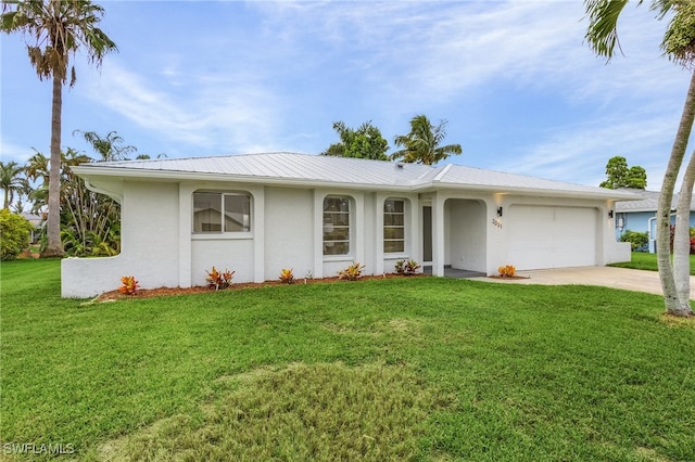 ranch-style house with a garage and a front lawn