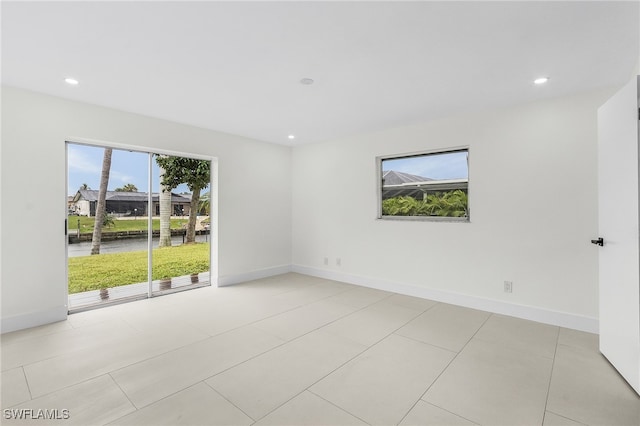 view of tiled spare room