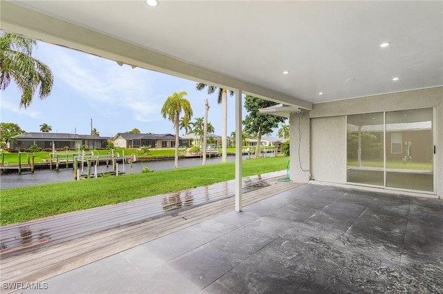 view of patio / terrace with a water view