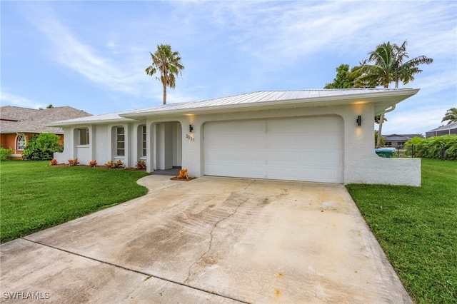 ranch-style house with a garage and a front lawn