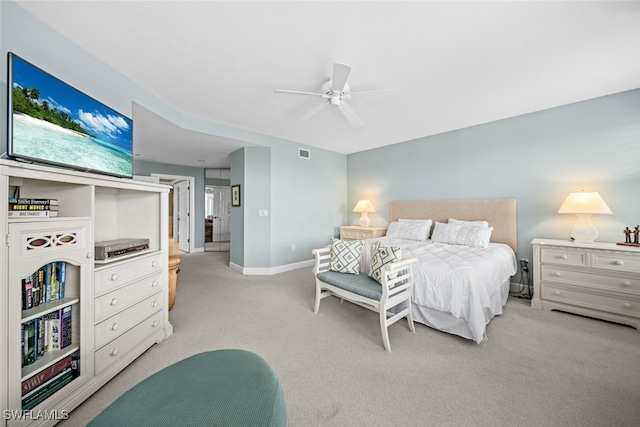 bedroom with light colored carpet and ceiling fan