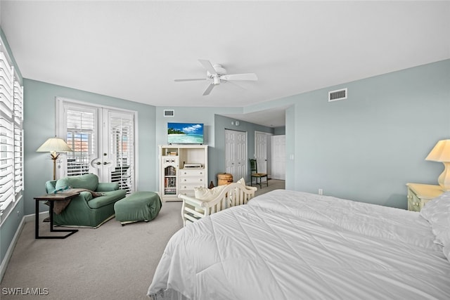 carpeted bedroom with french doors, access to outside, and ceiling fan