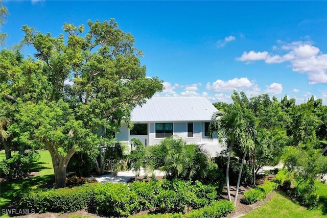 1610 Sabal Sands Rd, Sanibel, FL 33957 - view of front of house with metal roof