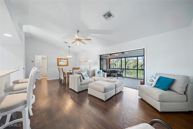 living room with ceiling fan, lofted ceiling, and dark hardwood / wood-style flooring