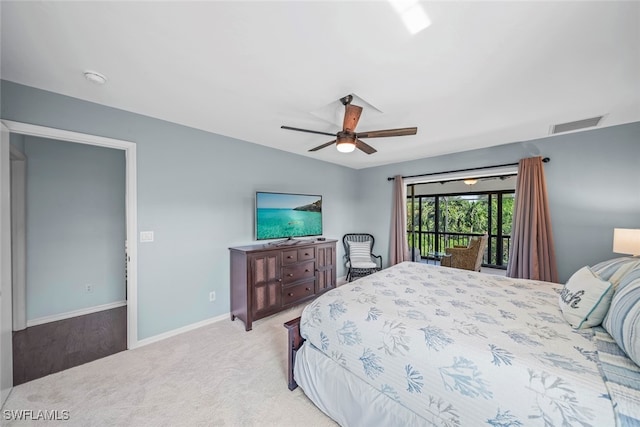 carpeted bedroom featuring ceiling fan and access to exterior