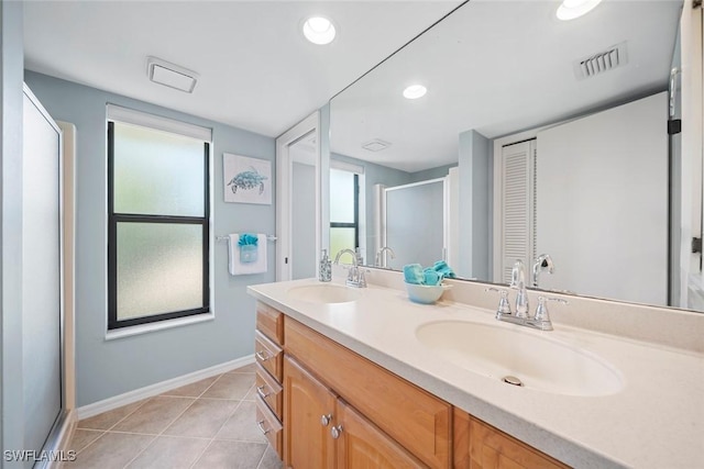 1610 Sabal Sands Rd, Sanibel, FL 33957 - full bathroom featuring a sink, a stall shower, baseboards, and visible vents