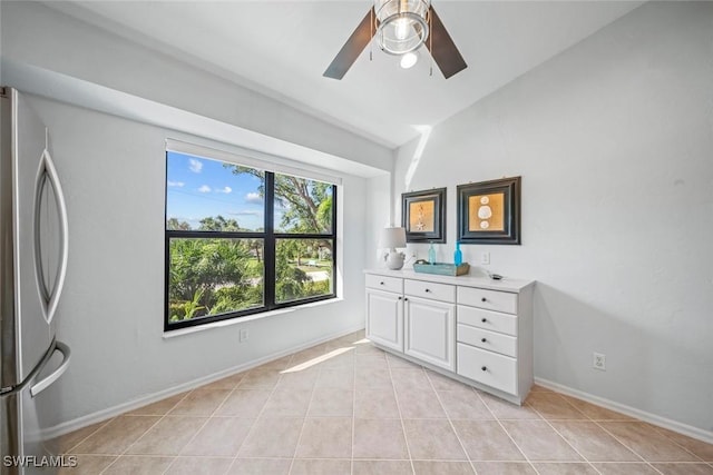 1610 Sabal Sands Rd, Sanibel, FL 33957 - interior space featuring a ceiling fan, lofted ceiling, baseboards, tile patterned flooring, and vanity